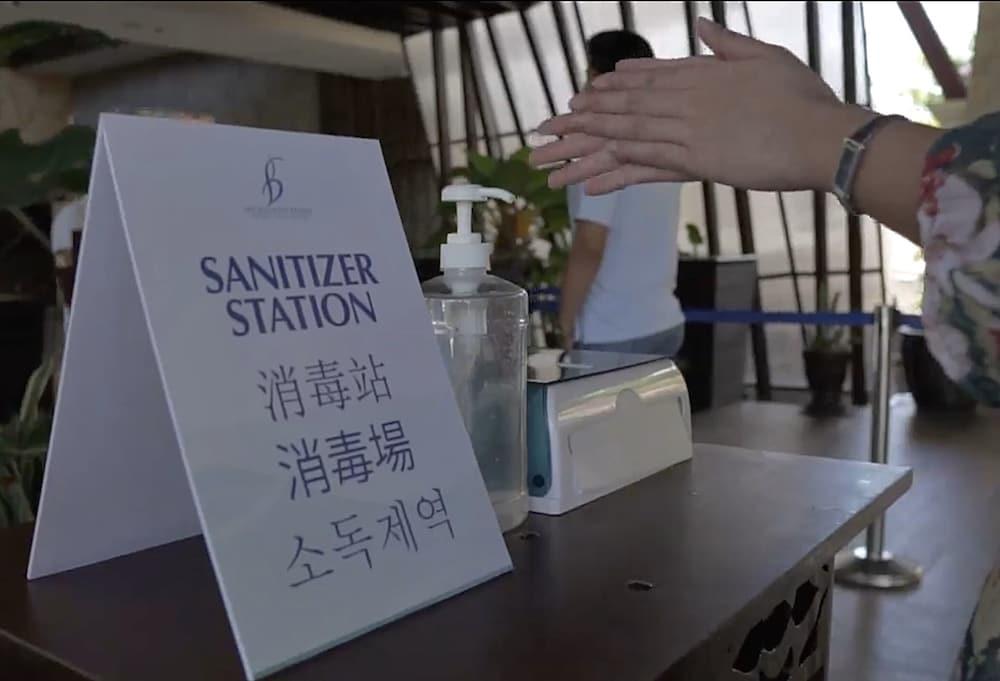 The Bellevue Resort Đảo Đảo Panglao Ngoại thất bức ảnh A hand sanitizer station at a hotel in Seoul, South Korea